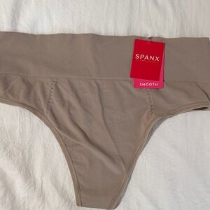 SPANX Smooth Seamless Thong in Taupe